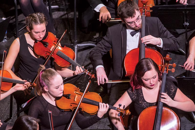 Students playing instruments