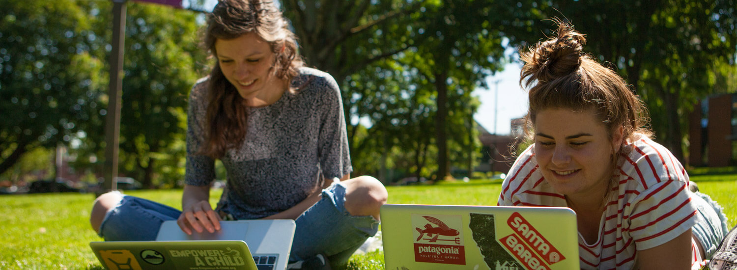 Two students study in Tiffany Loop.