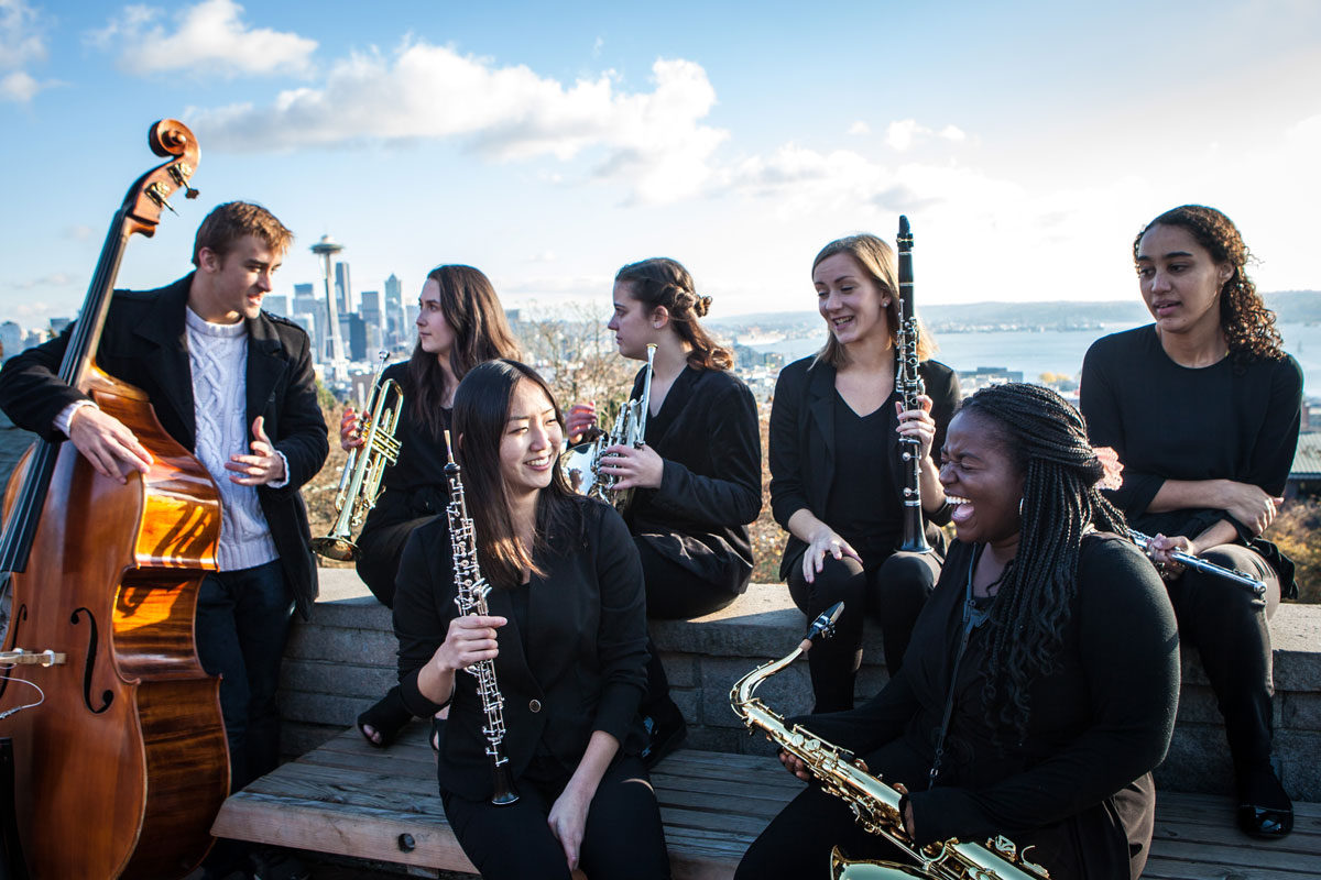 band poses with instruments at kerry park