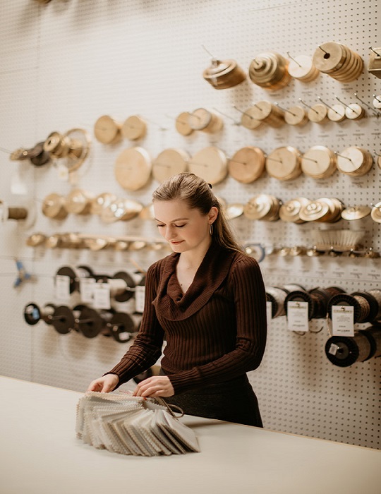 Melissa Perry looking at fabric samples