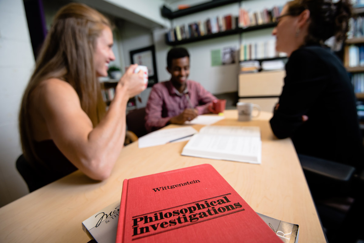 Associate Professor of Philosophy Rebekah Rice meets with philosophy majors