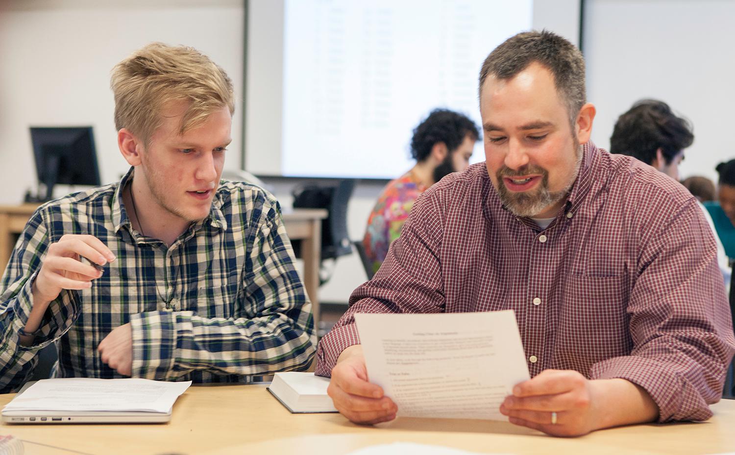 Leland Saunders teaching a philosophy student