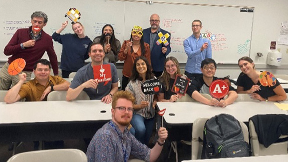 Students pose with silly props