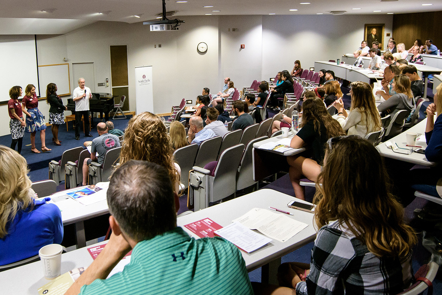 Conference attendees at a presentation in Demaray Hall