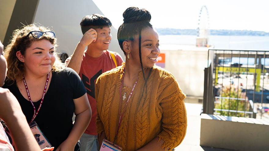 Students smile in the sunlight during the Early Connections downtown Seattle excursion