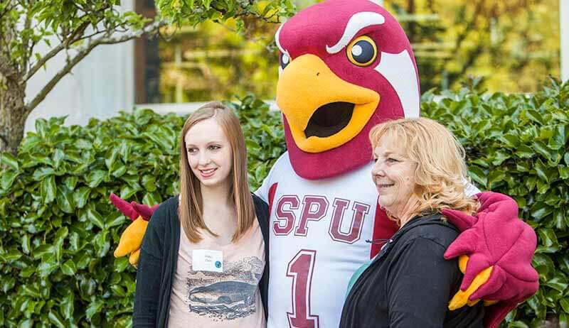 Talon the falcon posing with fans