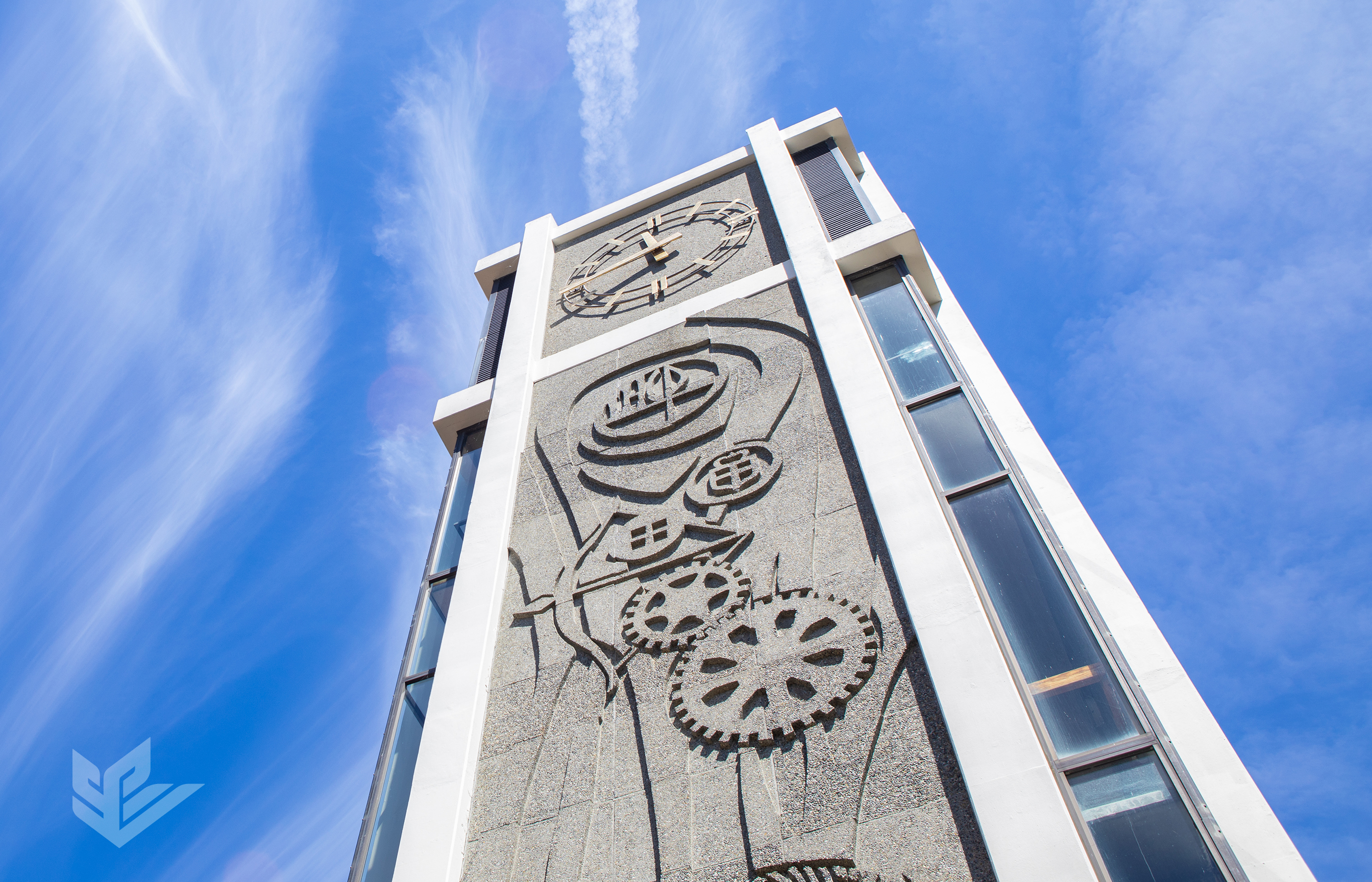 Seattle Pacific University's iconic clock tower against the blue Northwest sky.