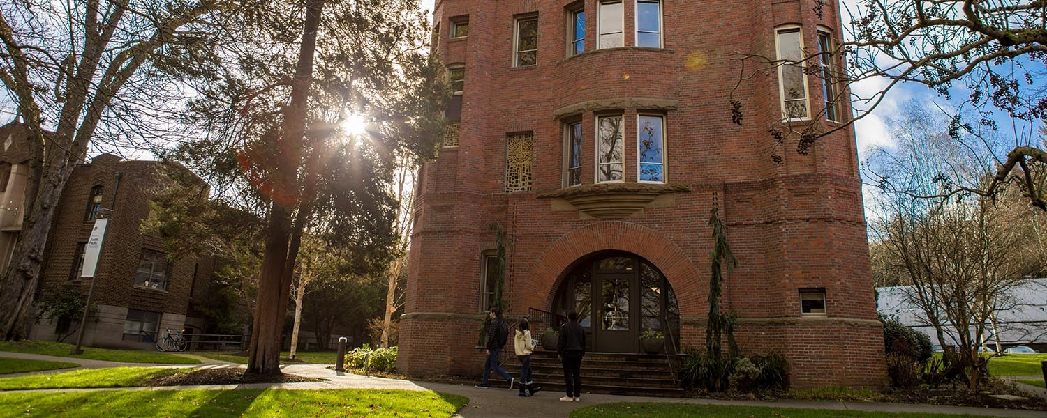 Students gather in front of Alexander Hall at Seattle Pacific University