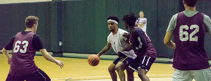 SPU students playing intramural basketball