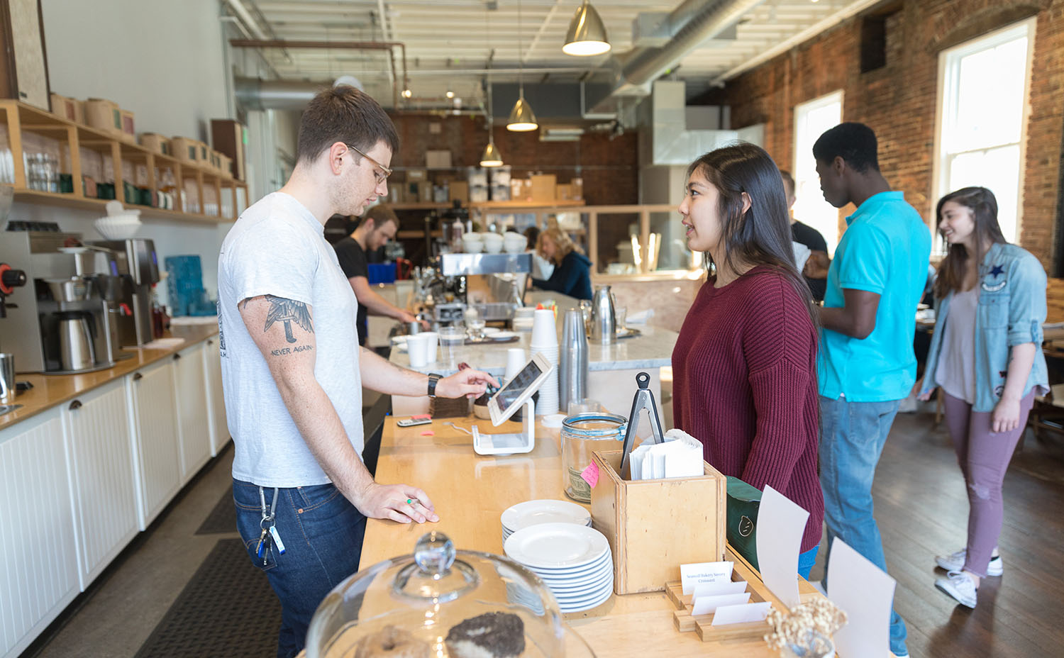 Seattle Pacific University students buying coffee downtown