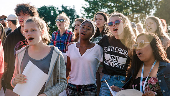 High school students sing during the Immerse summer intensive at Camp Casey Conference Center