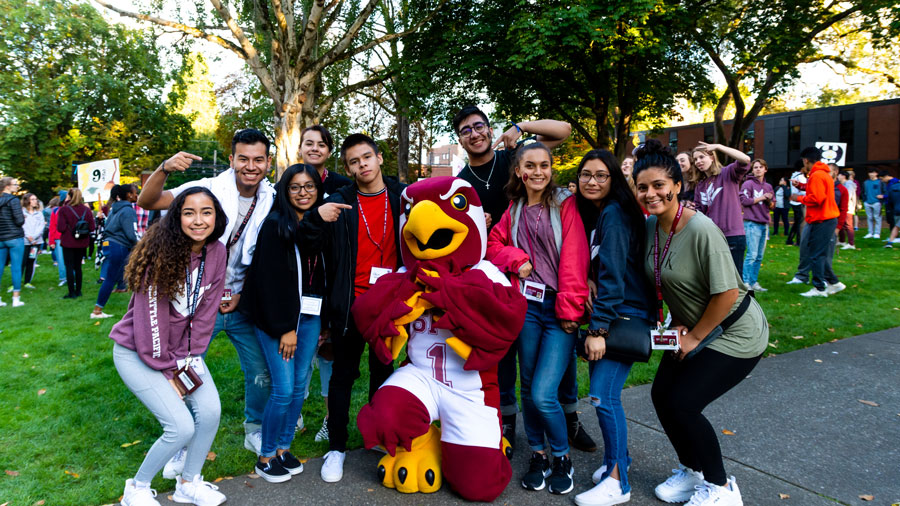 student pose with Falcon