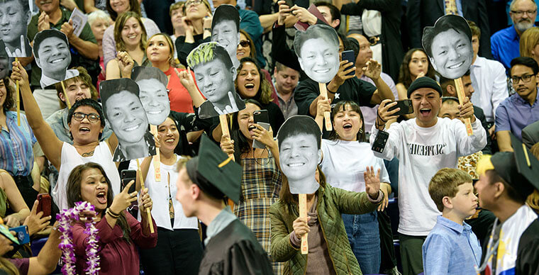 Family and friends cheer at the 2019 SPU Undergraduate Commencement ceremony - photo by John Crozier