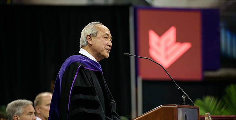 Chi-Dooh "Skip" Li speaks at the 2019 SPU Undergraduate Commencement ceremony - photo by John Crozier