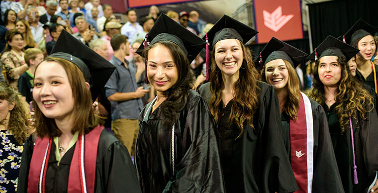 SPU students file in at the 2019 Undergraduate Commencement ceremony - photo by John Crozier