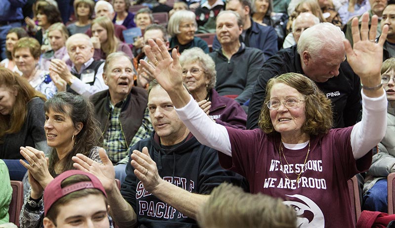 Alumns at a Homecoming game